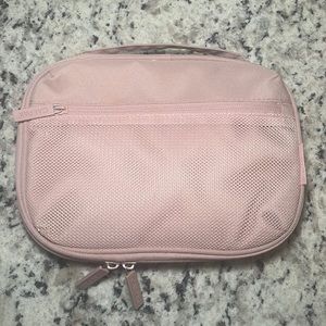 Calpak pink sand tech organizer